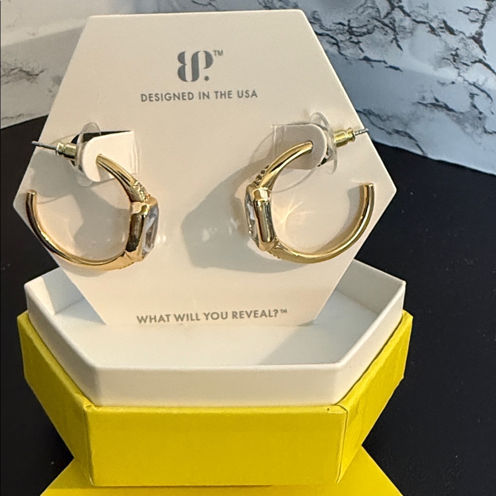 BP What a charmer- Gold plating with lab created aquamarine